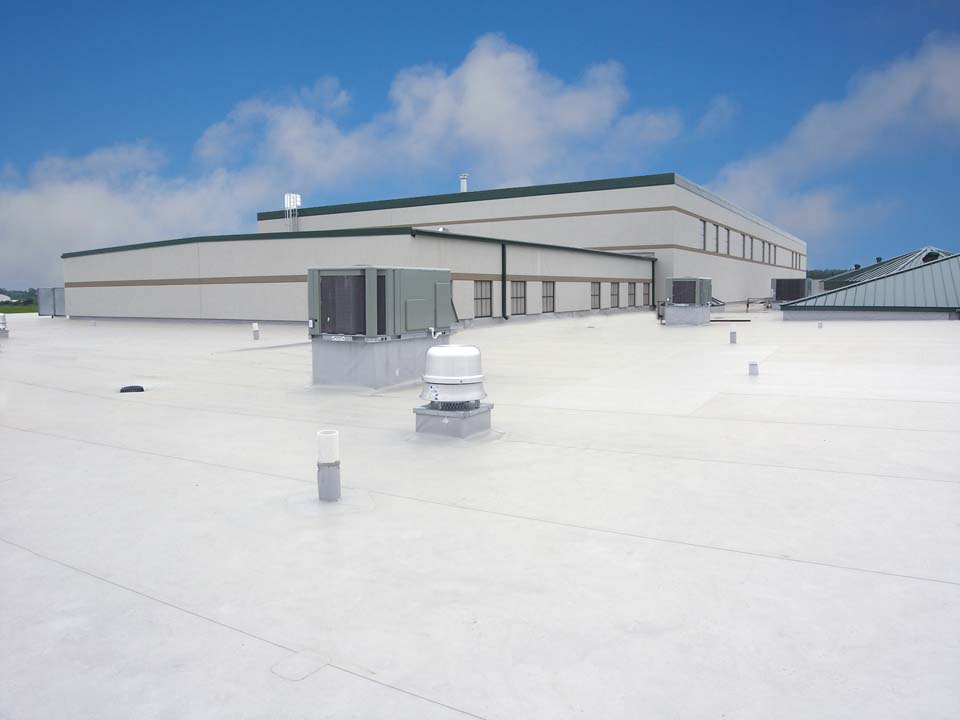 Ideal Roofing and Construction, flat commercial roofing, client Alma middle school 2 Duro-Last roof